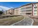 Building exterior with landscaping and walkway at 300 S Clinton St # 10C, Denver, CO 80247