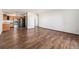 Galley kitchen with wood cabinets and stainless steel appliances at 300 S Clinton St # 10C, Denver, CO 80247