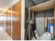 Indoor storage unit with wire shelving and wood door at 300 S Clinton St # 10C, Denver, CO 80247