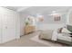 Cozy bedroom featuring soft carpet, updated windows, and a stylish wooden dresser at 2767 W 38Th Ave, Denver, CO 80211