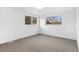 Bright bedroom with two windows, carpet flooring, and white walls at 2767 W 38Th Ave, Denver, CO 80211