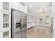 Spacious kitchen featuring stainless steel appliances and dining space at 2767 W 38Th Ave, Denver, CO 80211