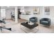 Open living space featuring modern furniture, plush seating, and adjacent kitchen with stainless appliances at 2767 W 38Th Ave, Denver, CO 80211