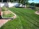 Large backyard with grassy area and white fence at 5421 S Sherman St, Littleton, CO 80121