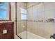 Clean bathroom, featuring a tiled shower and updated fixtures at 5421 S Sherman St, Littleton, CO 80121