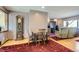 Cozy dining area with a small table and chairs near the living room at 5421 S Sherman St, Littleton, CO 80121