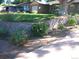 Landscaped front yard with retaining wall and plants at 5421 S Sherman St, Littleton, CO 80121