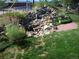 Waterfall feature with rocks and native plants at 5421 S Sherman St, Littleton, CO 80121