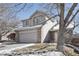 Front exterior of a well maintained home, with two car garage in suburban neighborhood at 19844 E Vassar Ave, Aurora, CO 80013