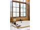Elegant bathroom with a soaking tub and decorative details that create a spa-like retreat at 7188 Raphael Ln, Littleton, CO 80125