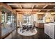 Cozy dining area with a chandelier and access to an outdoor space at 7188 Raphael Ln, Littleton, CO 80125