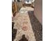 Backyard with rock ground, stepping stones, and wood fence at 11375 W Maplewood Ave, Littleton, CO 80127