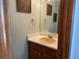 Bathroom featuring vintage yellow sink and light blue walls at 11375 W Maplewood Ave, Littleton, CO 80127