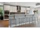 Kitchen with modern appliances, a breakfast bar, and ample counter space at 2508 S Pennsylvania St, Denver, CO 80210