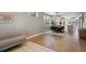 Open-concept living area with hardwood floors, modern furniture, and ample natural light at 2508 S Pennsylvania St, Denver, CO 80210