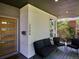 Inviting front porch with modern seating, offering a cozy outdoor space for relaxation at 2508 S Pennsylvania St, Denver, CO 80210