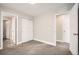 Neutrally decorated bedroom with adjacent bathroom and walk-in closet at 8917 Yates Dr, Westminster, CO 80031