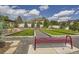 Bocce ball area with benches and beautiful landscaping in a common area at 8917 Yates Dr, Westminster, CO 80031