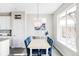 Cozy dining area with stylish lighting and comfortable seating, perfect for enjoying meals with Gathering and friends at 8917 Yates Dr, Westminster, CO 80031