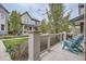 Inviting front porch with comfortable seating and charming architectural details, perfect for relaxing outdoors at 8917 Yates Dr, Westminster, CO 80031