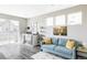 Comfortable living space with a stylish bar area, cozy seating, and natural light, perfect for relaxing and entertaining at 8917 Yates Dr, Westminster, CO 80031