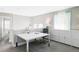 Bright home office featuring built-in storage, large desk, modern decor and natural light at 8917 Yates Dr, Westminster, CO 80031