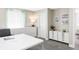 Bright home office featuring a white desk, cabinet and drawers, neutral paint, and natural light at 8917 Yates Dr, Westminster, CO 80031