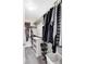 Walk-in closet with shelves, rods, and storage for shoes and other personal items at 8917 Yates Dr, Westminster, CO 80031