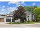 Corner lot home with mature landscaping, neutral colors, and plenty of natural light at 9478 Burgundy Cir, Highlands Ranch, CO 80126