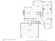 Detailed first floor plan layout showcasing the living room, kitchen, and garage at 9478 Burgundy Cir, Highlands Ranch, CO 80126