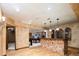 Finished basement including a wet bar, fireplace, and pool table for entertaining at 2409 E Cedar Ave, Denver, CO 80209