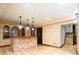 Finished basement with hardwood floors, wet bar, tiled front and staircase at 2409 E Cedar Ave, Denver, CO 80209