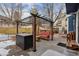 Outdoor patio with pergola and grill, perfect for hosting barbecues and enjoying the backyard at 16200 Quarry Hill Dr, Parker, CO 80134