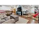 Spacious finished basement with comfortable seating, entertainment area, and laminate flooring, great for Gathering activities at 16200 Quarry Hill Dr, Parker, CO 80134