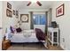 Cozy bedroom featuring a ceiling fan, a window, and tasteful décor in a comfortable home setting at 16200 Quarry Hill Dr, Parker, CO 80134