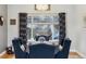 Cozy dining area with stylish decor, a chandelier, and a backyard view, ideal for intimate dinners at 16200 Quarry Hill Dr, Parker, CO 80134