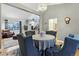 Spacious living room with dining area, hardwood floors, and stylish decor, creating a welcoming atmosphere at 16200 Quarry Hill Dr, Parker, CO 80134