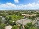 An aerial view of a neighborhood and school with downtown in the distance at 416 W 3Rd Ave, Denver, CO 80223