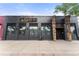 Adrift, a dark and stylish brick building with tiki statues flanking the entrance, offers a unique dining experience at 416 W 3Rd Ave, Denver, CO 80223