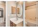 Bathroom with vanity, sink, and shower/tub combo at 1342 S Idalia St, Aurora, CO 80017