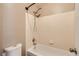 Simple bathroom with shower, tub and toilet at 1342 S Idalia St, Aurora, CO 80017