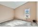 Bright bedroom with window, carpet, and window A/C unit at 1342 S Idalia St, Aurora, CO 80017