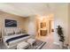 Virtually staged main bedroom with ensuite bathroom at 1342 S Idalia St, Aurora, CO 80017