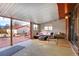 Covered patio with outdoor seating, ideal for relaxation and entertaining at 3885 Hoyt St, Wheat Ridge, CO 80033
