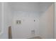Laundry room with utility shelf at 4437 Cornish Way, Denver, CO 80239