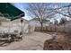 Backyard with seating area, lush landscaping, and mature trees at 1011 S Valentia St # 121, Denver, CO 80247