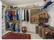 Walk-in closet with clothing racks, shelves, and carpeted floors at 1011 S Valentia St # 121, Denver, CO 80247