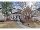 Charming two-story home with brick accents, a welcoming front porch and mature trees in a well-kept lawn at 1011 S Valentia St # 121, Denver, CO 80247