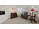 Cozy sitting room with natural light and neutral paint at 1011 S Valentia St # 121, Denver, CO 80247