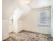 View of bedroom with two windows and wall to wall carpet at 1805 W Stoll Pl, Denver, CO 80221